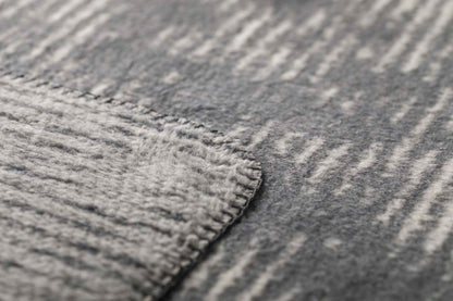 SAVONA throw "structures" in . Throw Blanket made by David Fussenegger , a family-run mill in Austria.