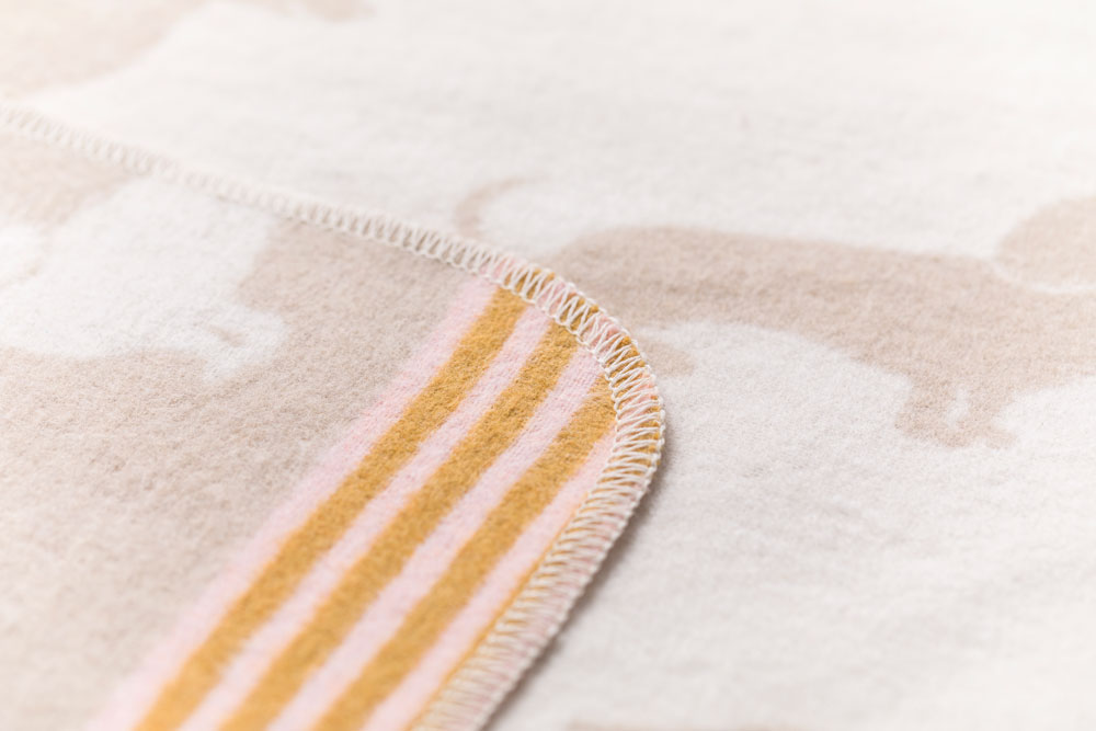 JUWEL baby blanket "dachshund" in . Blanket made by David Fussenegger , a family-run mill in Austria.