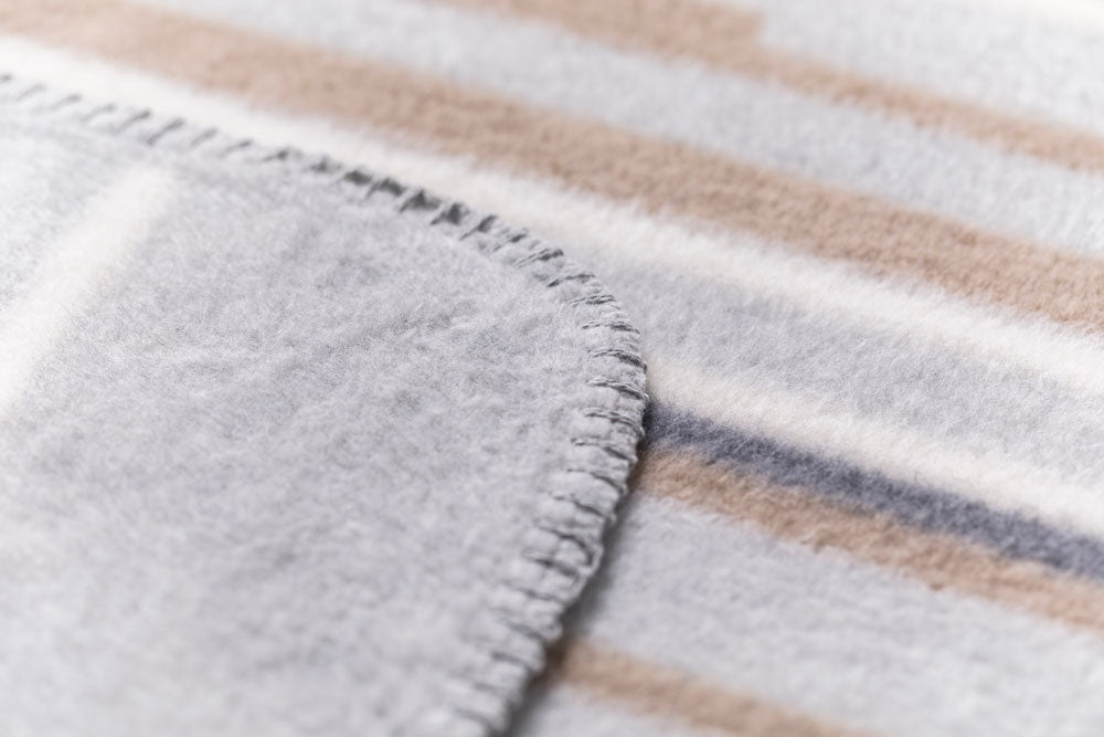 SAVONA throw "short lines horizontal" in . Throw Blanket made by David Fussenegger , a family-run mill in Austria.