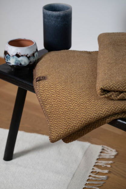 MERANO Throw "Herringbone" in . Throw Blanket made by David Fussenegger , a family-run mill in Austria.