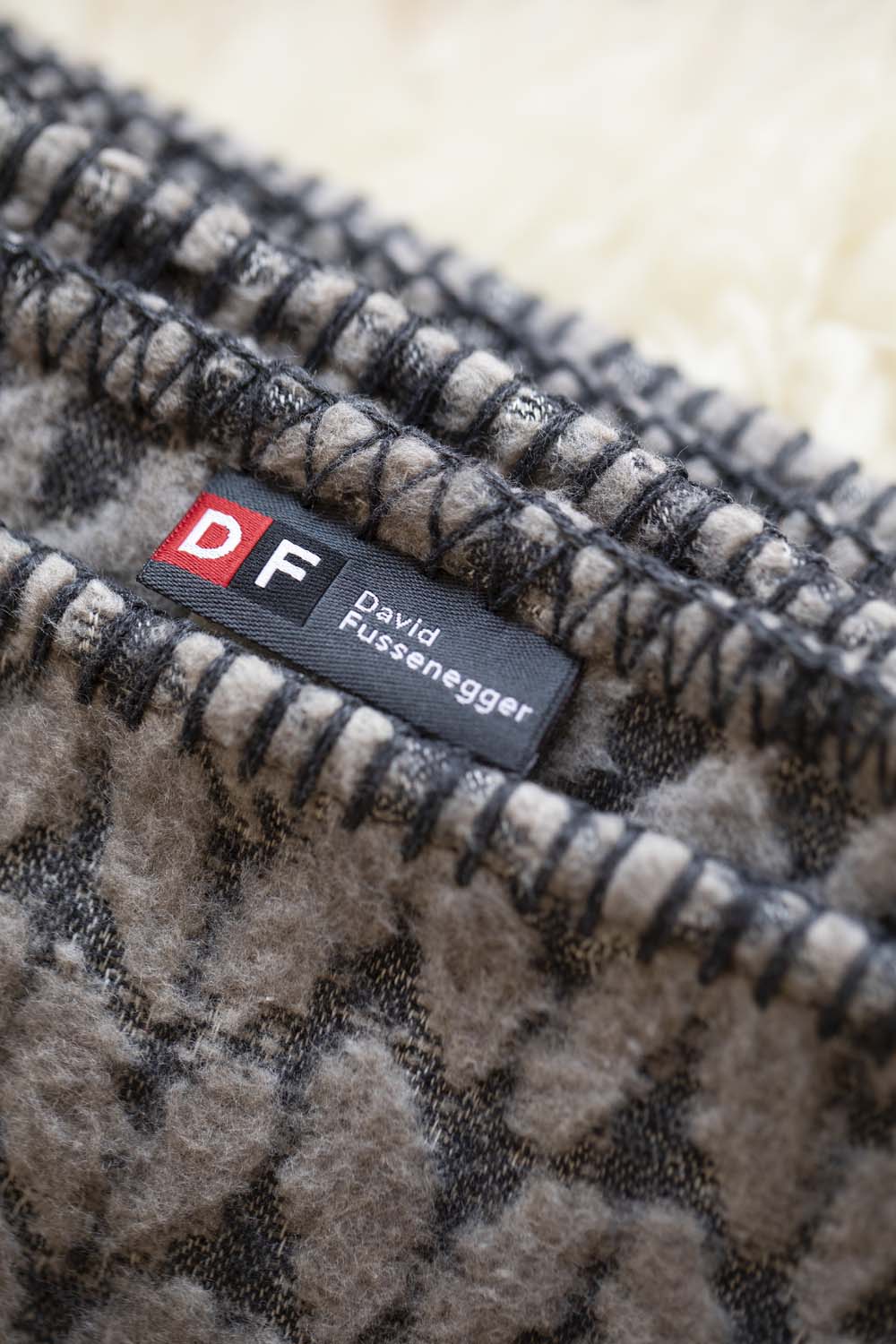 CARLA throw "knitted pattern" in . Throw Blanket made by David Fussenegger , a family-run mill in Austria.