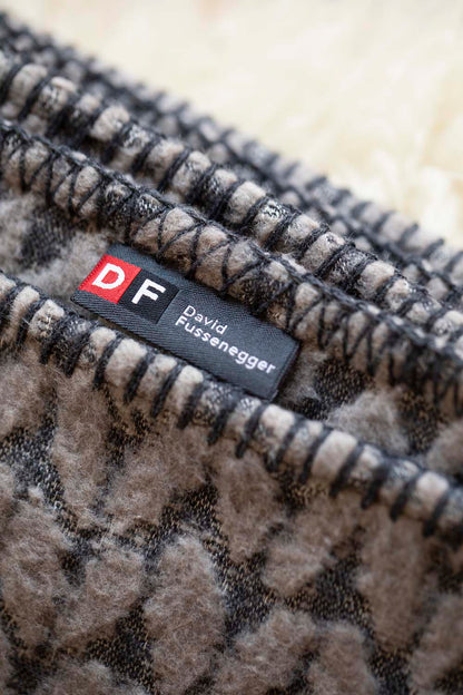 CARLA throw "knitted pattern" in . Throw Blanket made by David Fussenegger , a family-run mill in Austria.