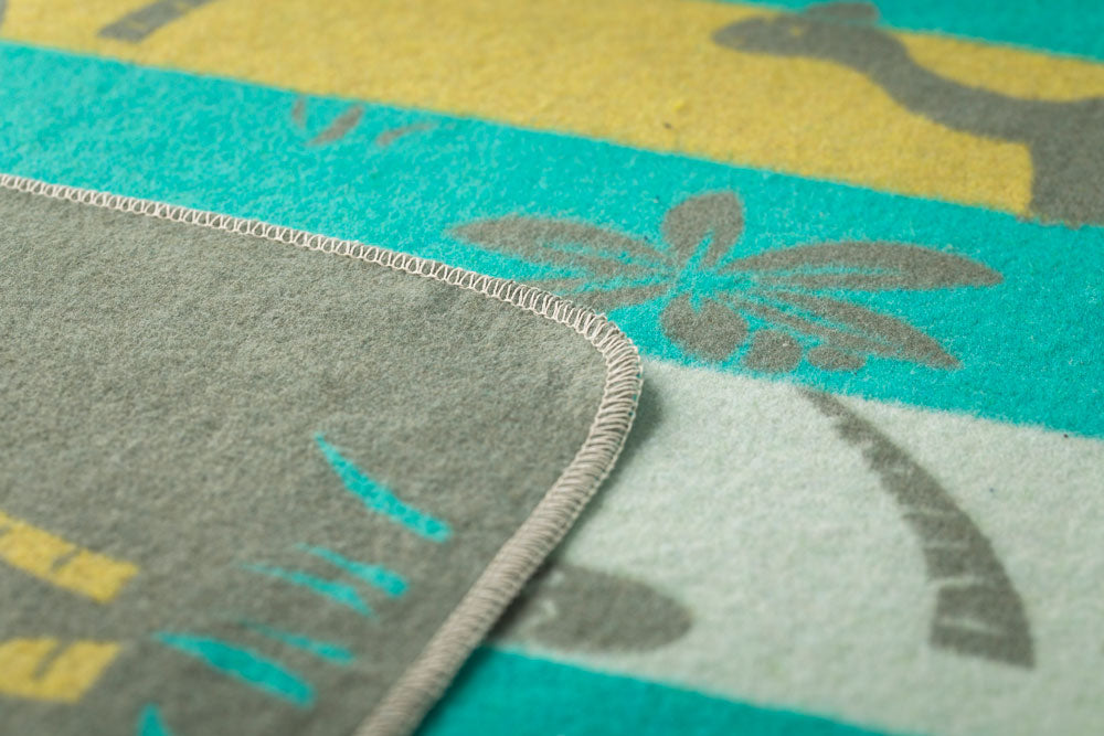 JUWEL baby blanket "dinos" in . Blanket made by David Fussenegger , a family-run mill in Austria.