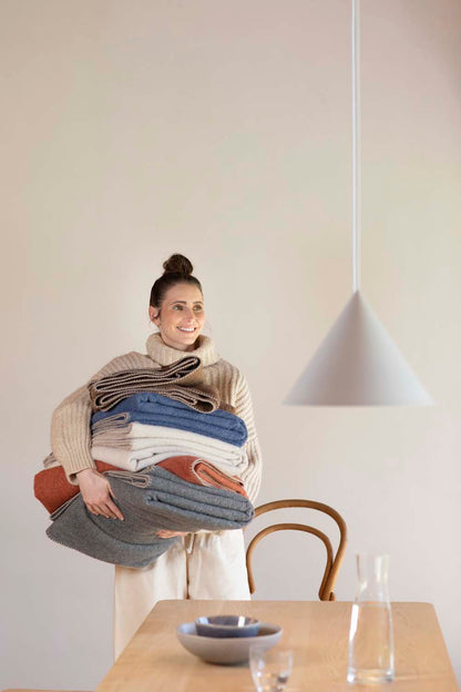 MERANO throw "faux solid"