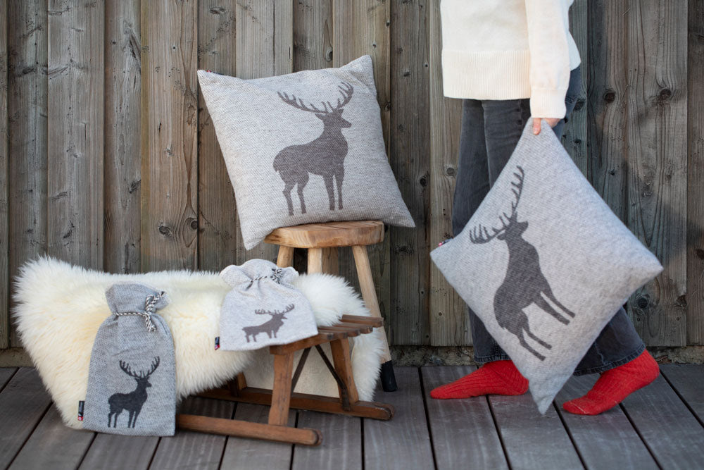 SILVRETTA cushion cover "centered deer" in . Cushion Cover made by David Fussenegger , a family-run mill in Austria.
