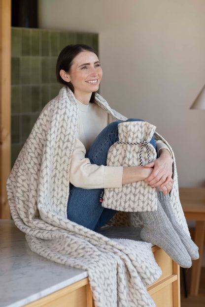 CARLA throw "knitted pattern" in . Throw Blanket made by David Fussenegger , a family-run mill in Austria.