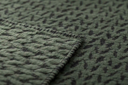 CARLA throw "knitted pattern" in . Throw Blanket made by David Fussenegger , a family-run mill in Austria.