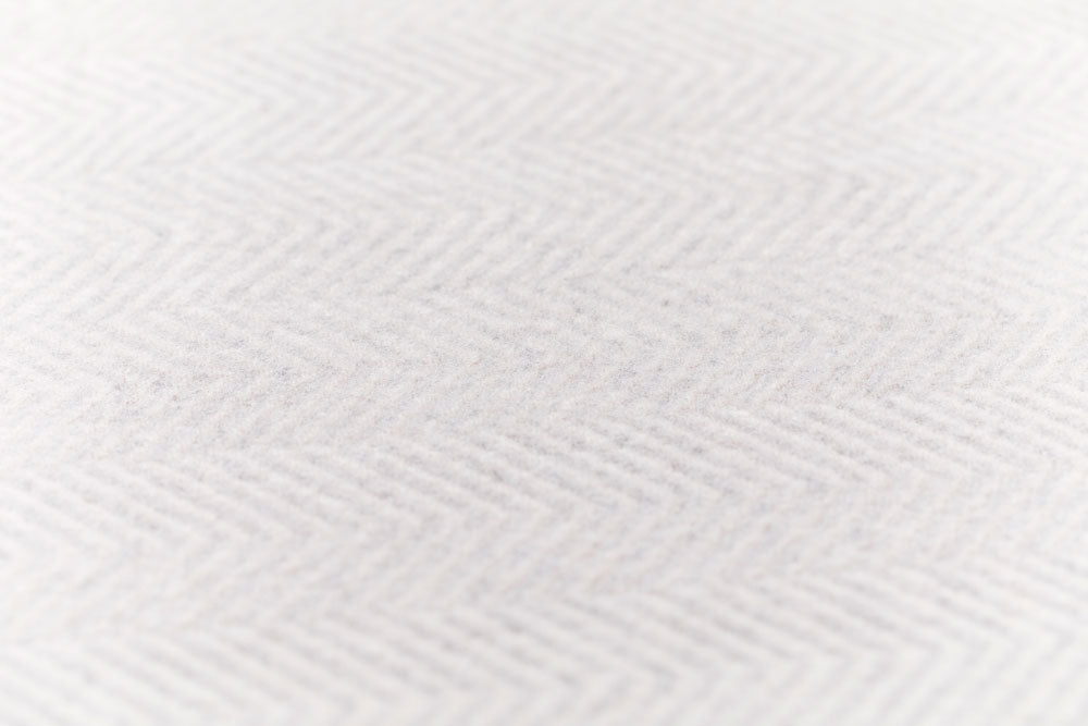 SILVRETTA throw "herringbone" in . Throw Blanket made by David Fussenegger , a family-run mill in Austria.
