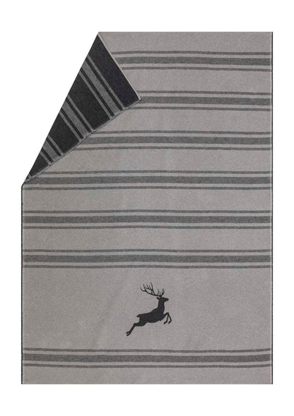 LUCA throw flannel "jumping stag / stripes" in dark grey . Throw Blanket made by David Fussenegger , a family-run mill in Austria.