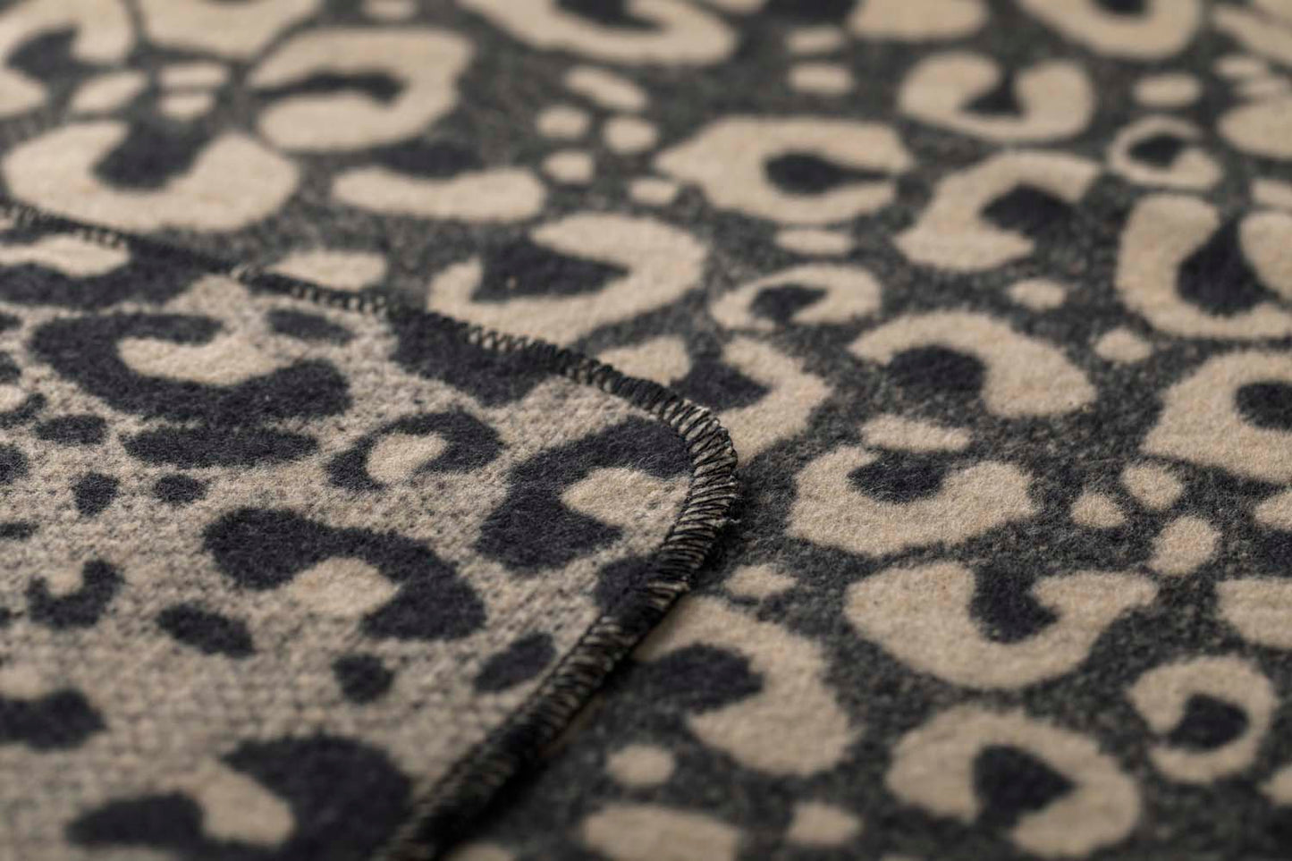 SILVRETTA throw "leo" in . Throw Blanket made by David Fussenegger , a family-run mill in Austria.