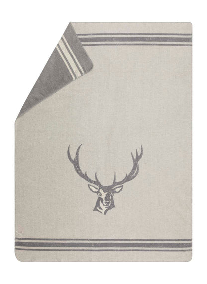 SAVONA throw "stag/antlers" in graphite . Throw Blanket made by David Fussenegger , a family-run mill in Austria.