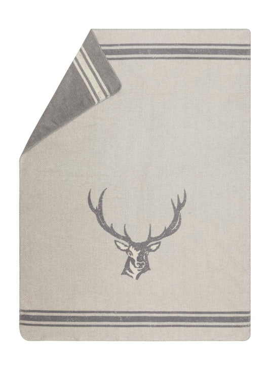 SAVONA throw "stag/antlers" in graphite . Throw Blanket made by David Fussenegger , a family-run mill in Austria.