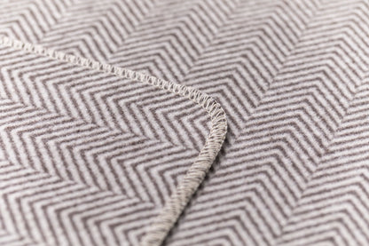 SILVRETTA throw "herringbone" in . Throw Blanket made by David Fussenegger , a family-run mill in Austria.