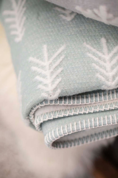CARLA throw "rows of trees" in . Throw Blanket made by David Fussenegger , a family-run mill in Austria.