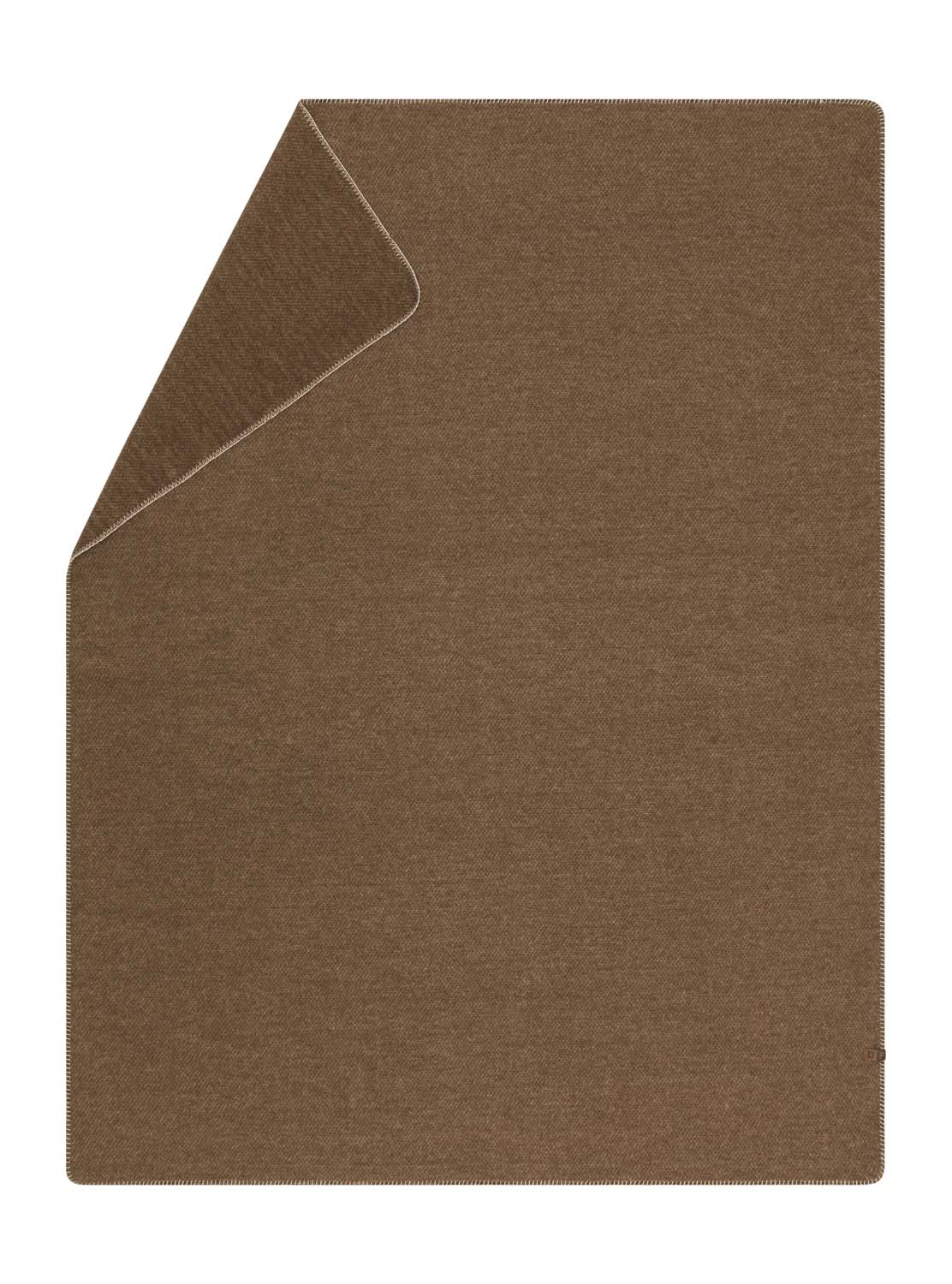 MERANO throw "faux solid" in . made by INDIGO 11 , a family-run mill in Austria.