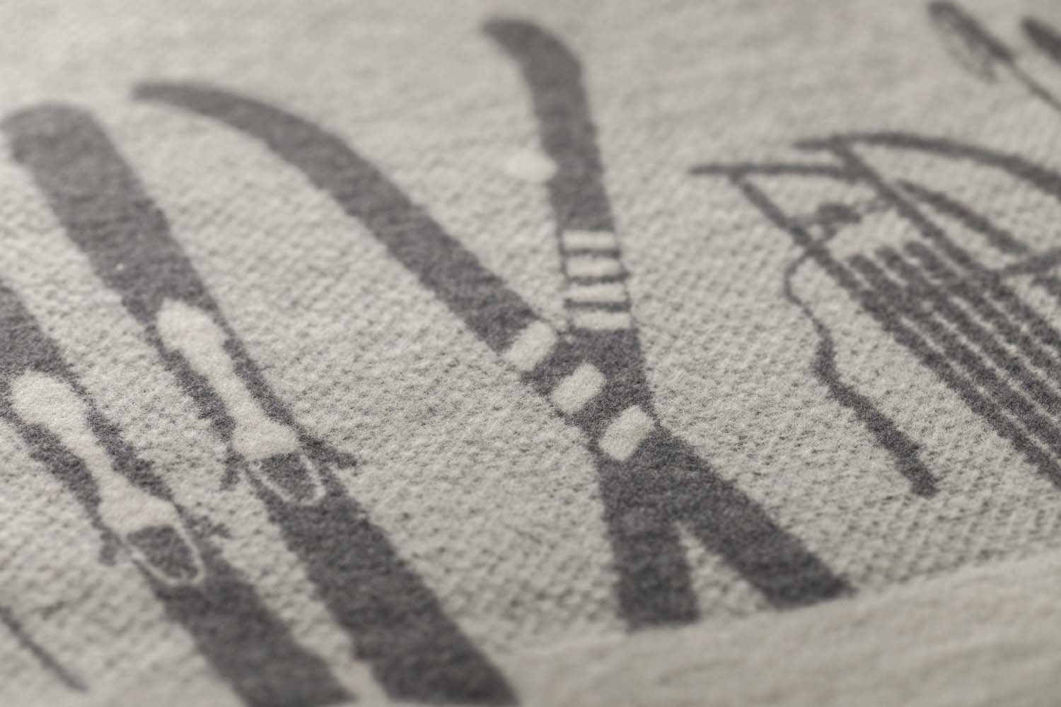 SILVRETTA throw "skis & tobbogan" in . Throw Blanket made by David Fussenegger , a family-run mill in Austria.