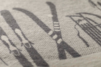 SILVRETTA throw "skis & tobbogan" in . Throw Blanket made by David Fussenegger , a family-run mill in Austria.