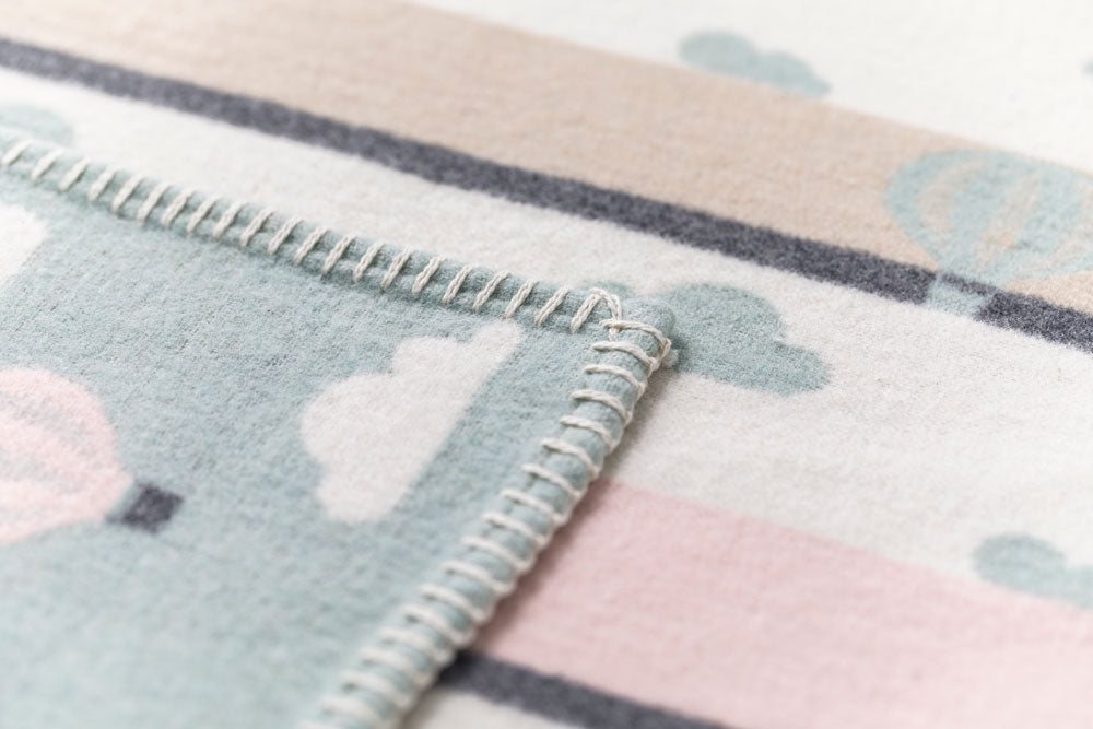LENA baby blanket organic "hot air balloons" in . Blanket made by David Fussenegger , a family-run mill in Austria.