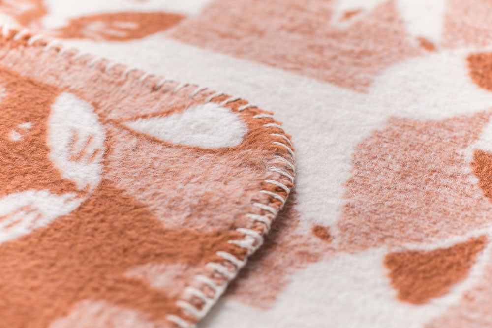 MILA baby blanket "pack of foxes" in . Blanket made by David Fussenegger , a family-run mill in Austria.