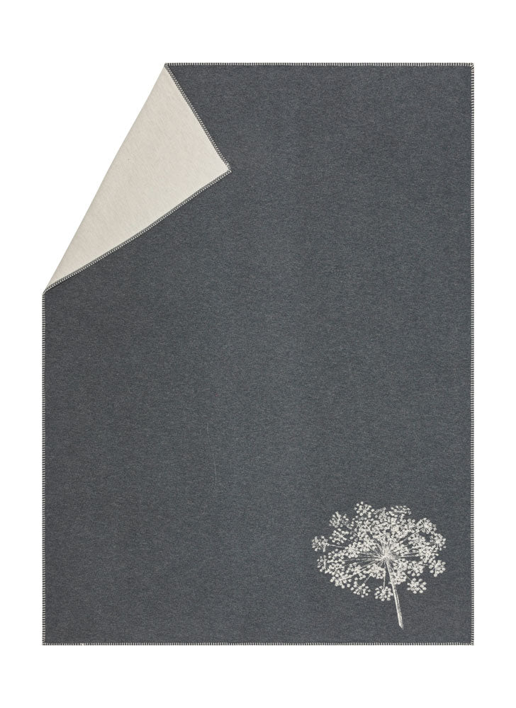 JADE throw "single umbel" organic cotton in charcoal . Throw Blanket made by David Fussenegger , a family-run mill in Austria.