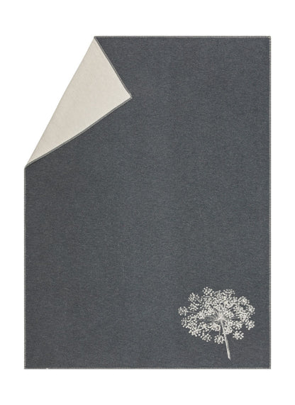 JADE throw "single umbel" organic cotton in charcoal . Throw Blanket made by David Fussenegger , a family-run mill in Austria.