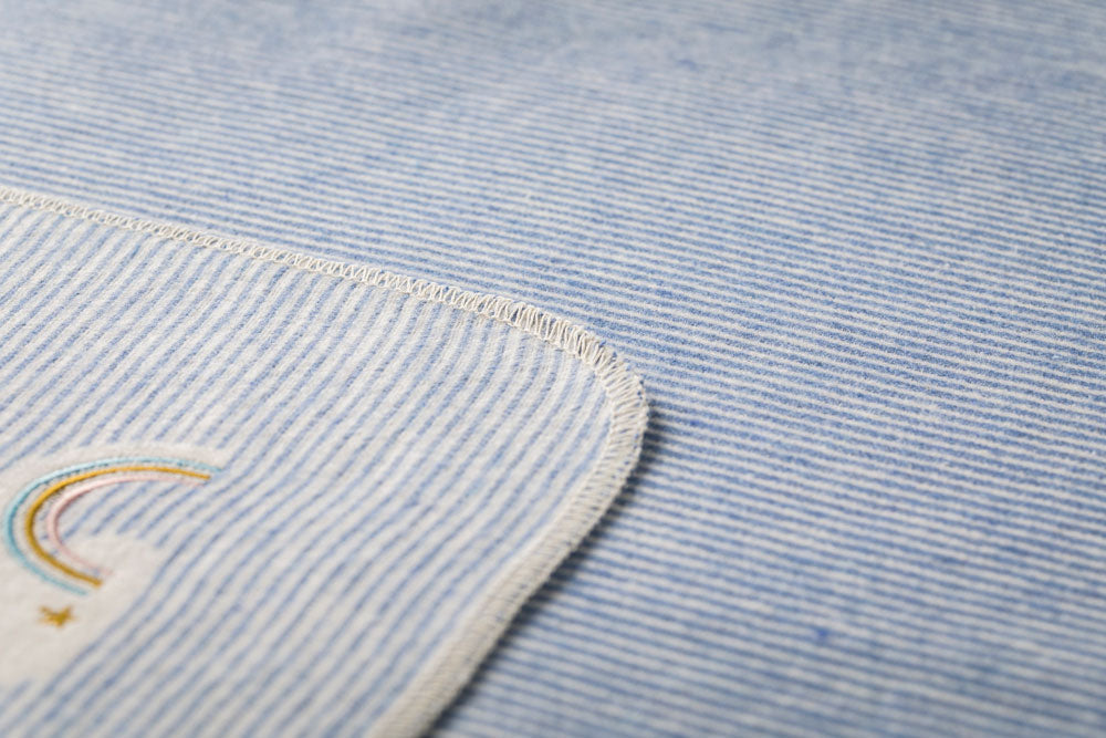 JUWEL baby blanket "stripes/rainbow" with embroidery in . Blanket made by David Fussenegger , a family-run mill in Austria.