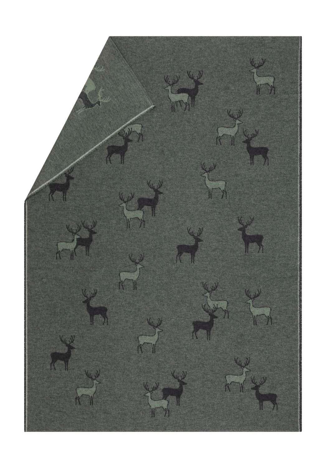 LUCA throw "pairs of stags" in ivy . Throw Blanket made by David Fussenegger , a family-run mill in Austria.