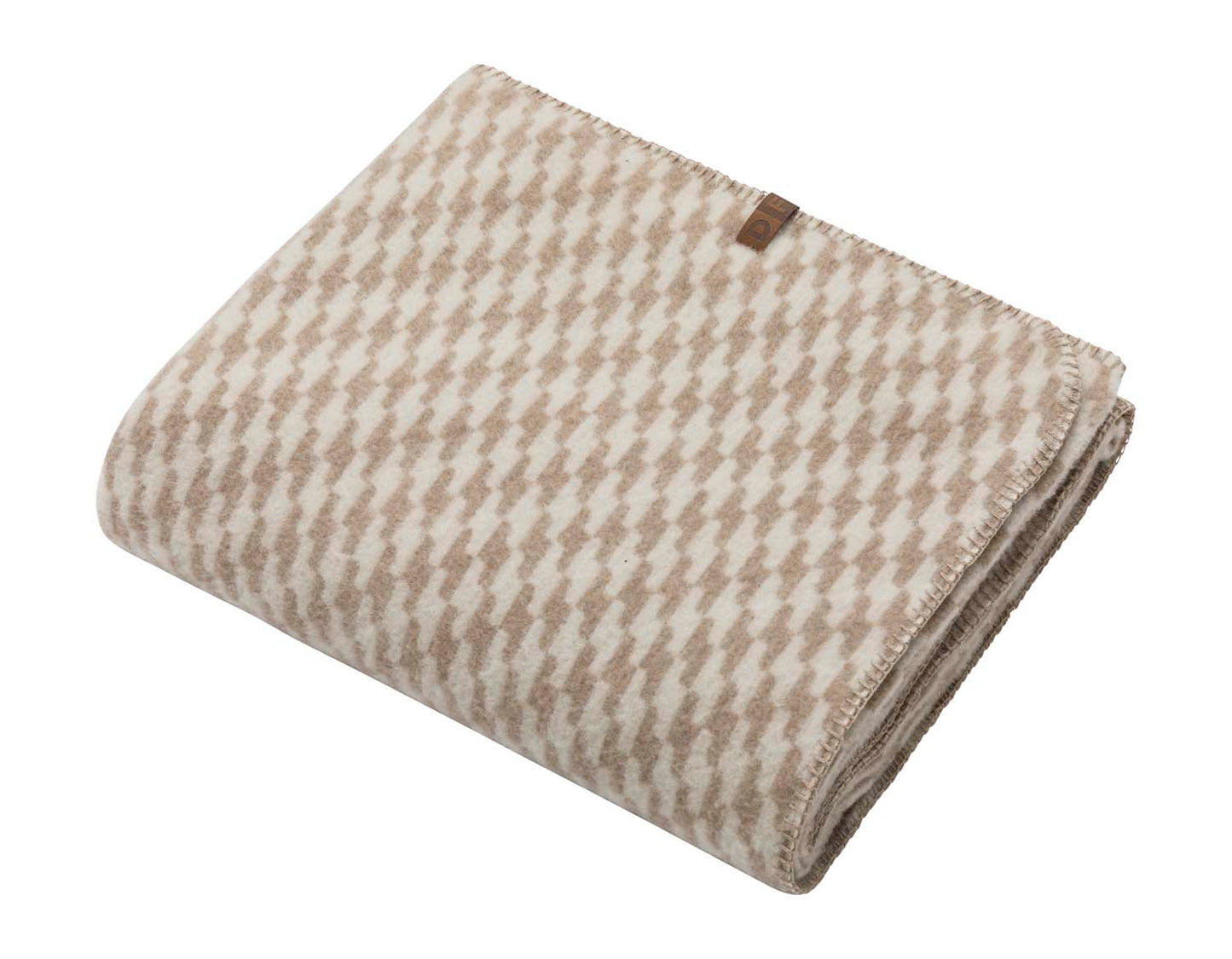 MERANO throw "houndstooth" in . made by INDIGO 11 , a family-run mill in Austria.