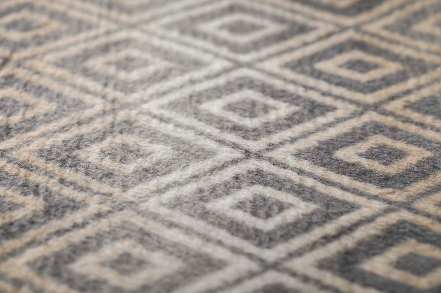 SAVONA throw "lozenge shapes gradient" in . Throw Blanket made by David Fussenegger , a family-run mill in Austria.