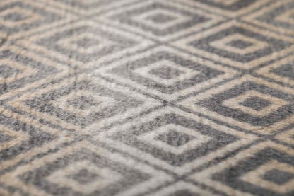 SAVONA throw "lozenge shapes gradient" in . Throw Blanket made by David Fussenegger , a family-run mill in Austria.