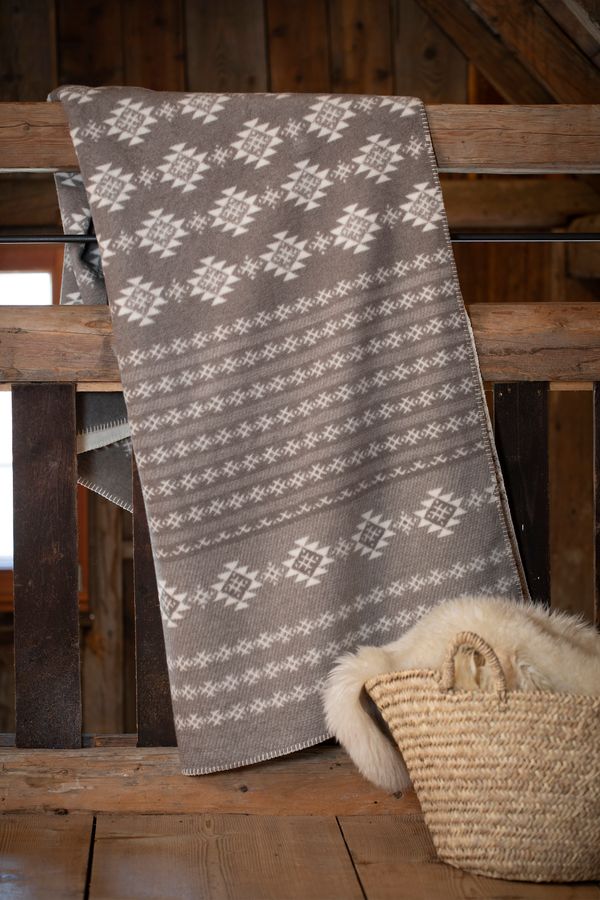 SAVONA Throw "Norwegian Border" in . Throw Blanket made by David Fussenegger , a family-run mill in Austria.