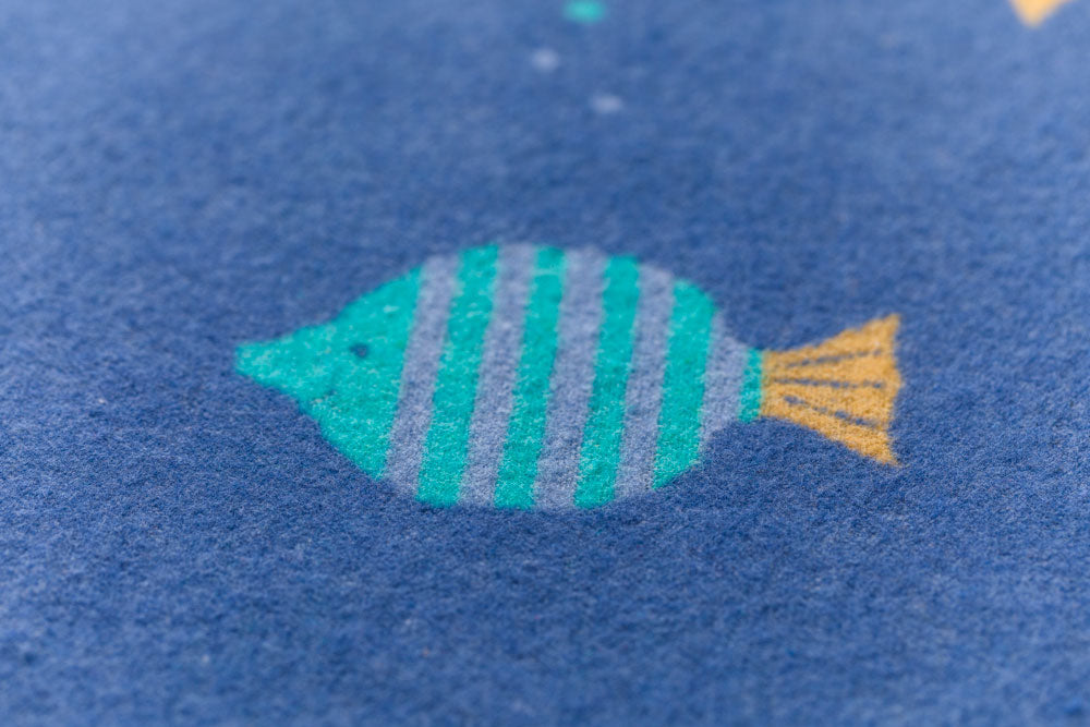 JUWEL toddler blanket "fish allover" in . Blanket made by David Fussenegger , a family-run mill in Austria.