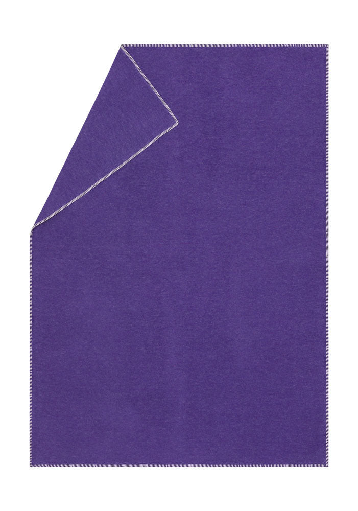 SYLT throw solid in lilac . Throw Blanket made by David Fussenegger , a family-run mill in Austria.