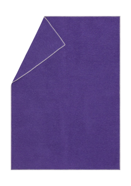 SYLT throw solid in lilac . Throw Blanket made by David Fussenegger , a family-run mill in Austria.