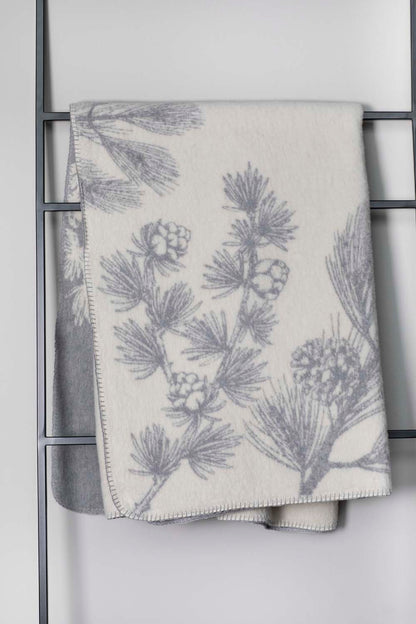 SAVONA throw "pine cone trees" in . Throw Blanket made by David Fussenegger , a family-run mill in Austria.