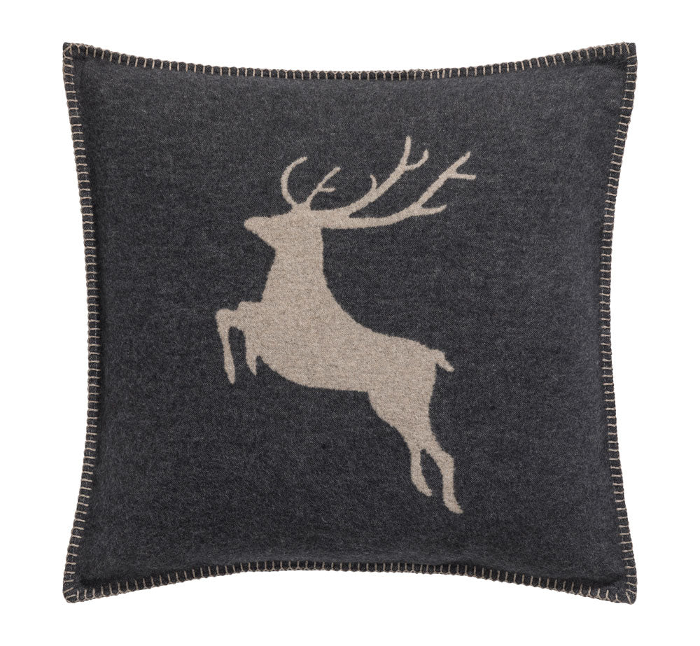 SYLT cushion cover "jumping stag" in charcoal . Cushion Cover made by David Fussenegger , a family-run mill in Austria.