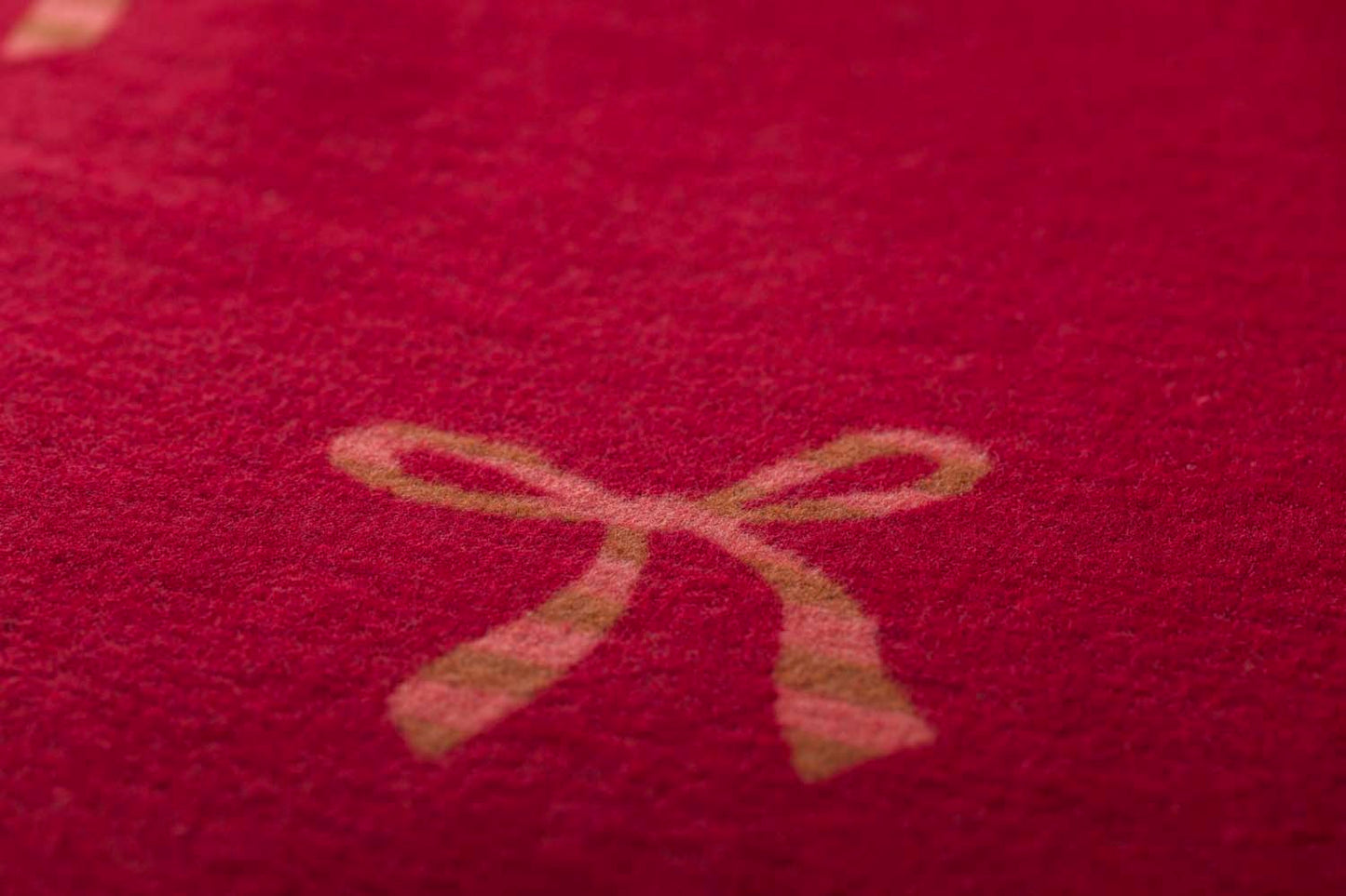 SILVRETTA throw "bows allover" in . Throw Blanket made by David Fussenegger , a family-run mill in Austria.