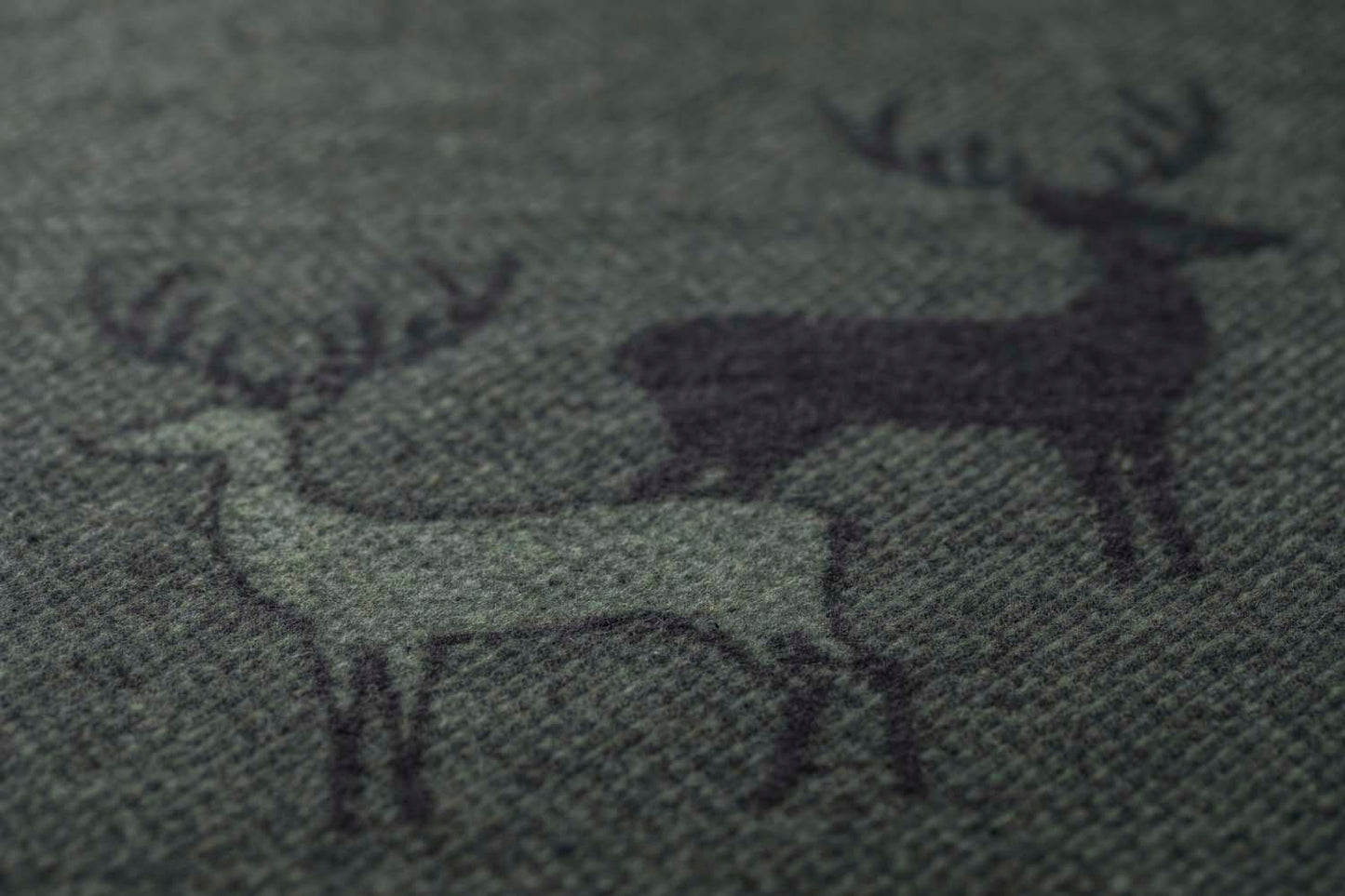 LUCA throw "pairs of stags" in . Throw Blanket made by David Fussenegger , a family-run mill in Austria.