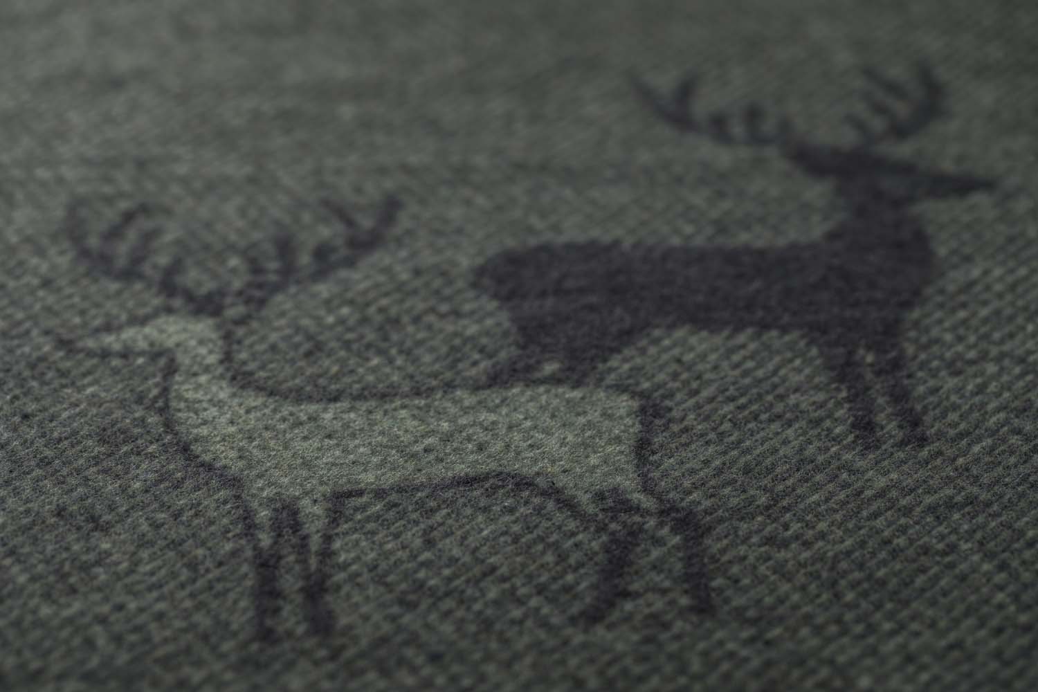 LUCA throw "pairs of stags" in . Throw Blanket made by David Fussenegger , a family-run mill in Austria.