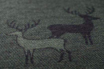 LUCA throw "pairs of stags" in . Throw Blanket made by David Fussenegger , a family-run mill in Austria.