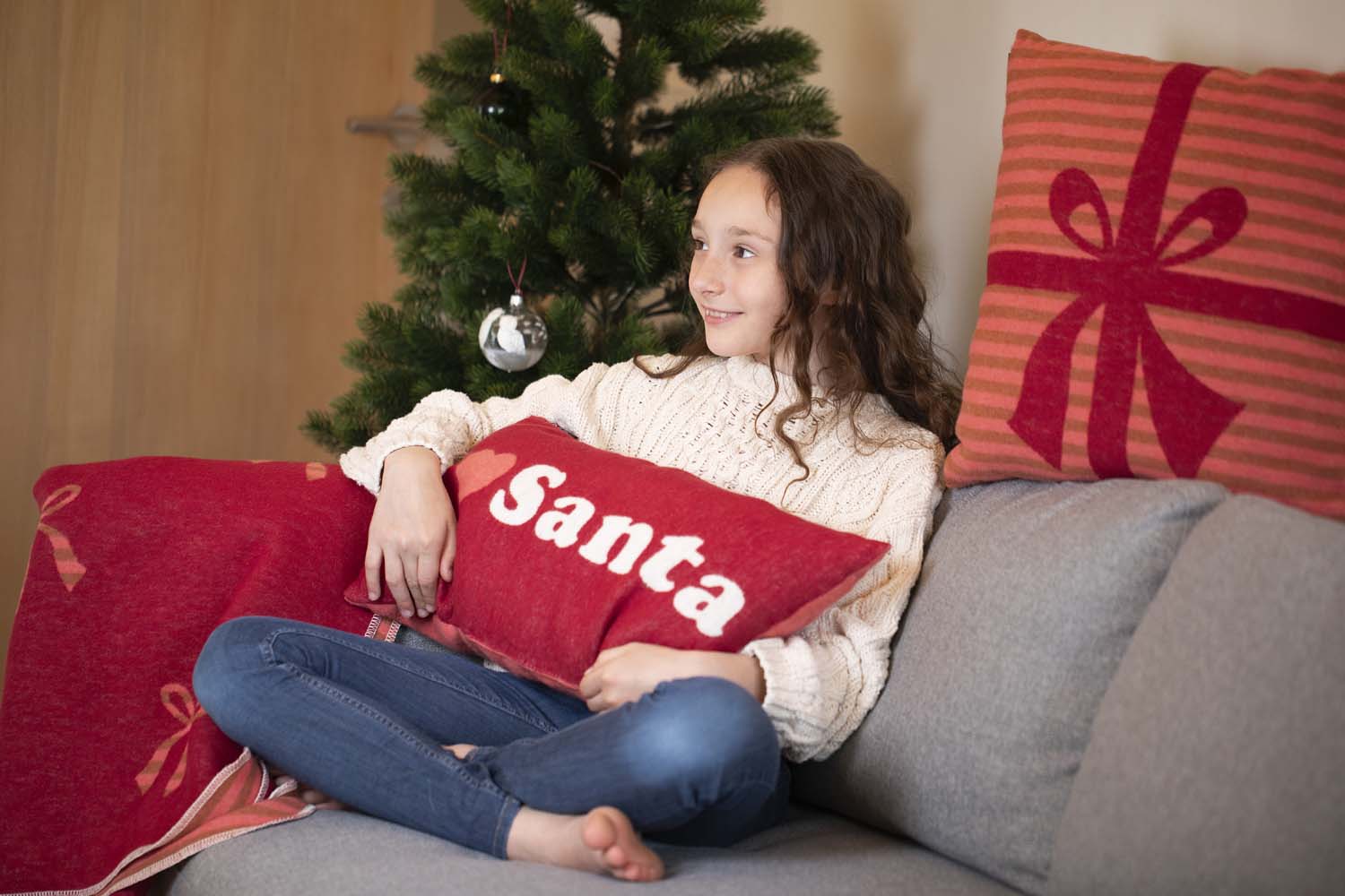 SILVRETTA pillow "present" in . Filled Cushion made by David Fussenegger , a family-run mill in Austria.