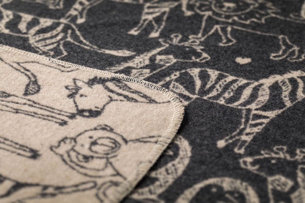 JUWEL baby blanket "safari animals" in . Blanket made by David Fussenegger , a family-run mill in Austria.