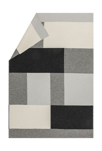 NOVA throw "color block" in black . Throw Blanket made by David Fussenegger , a family-run mill in Austria.