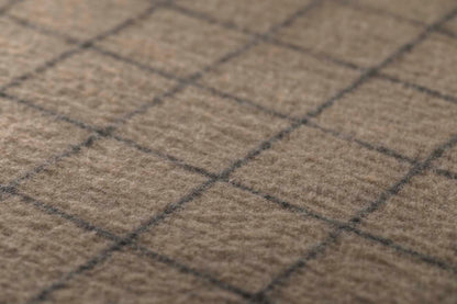 MERANO throw "checkered" in . made by INDIGO 11 , a family-run mill in Austria.