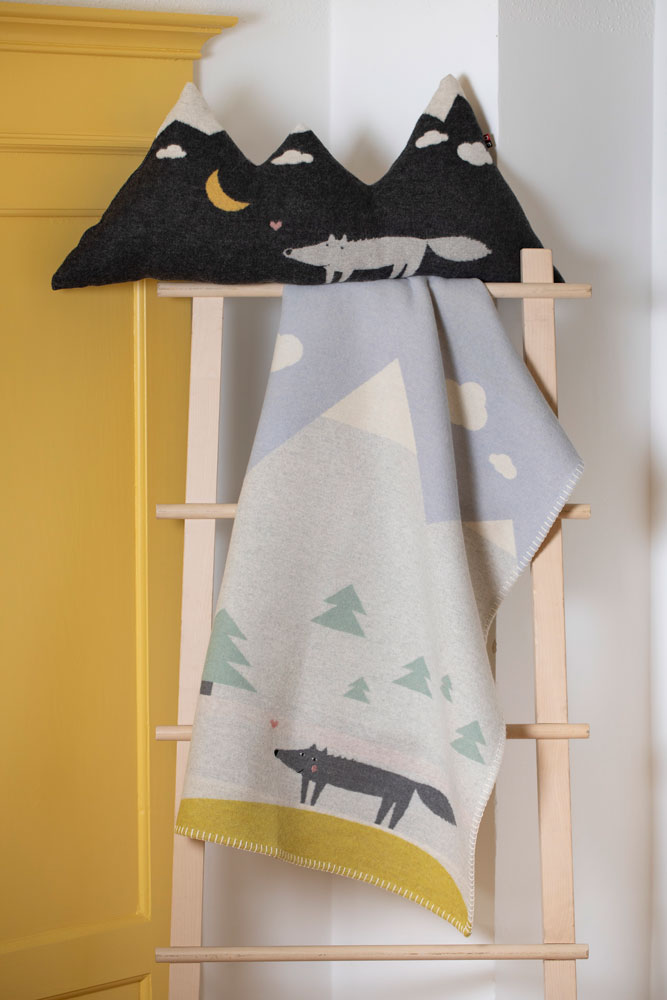 JUWEL pillow "wolf/mountain" includes filling in . Filled Cushion made by David Fussenegger , a family-run mill in Austria.