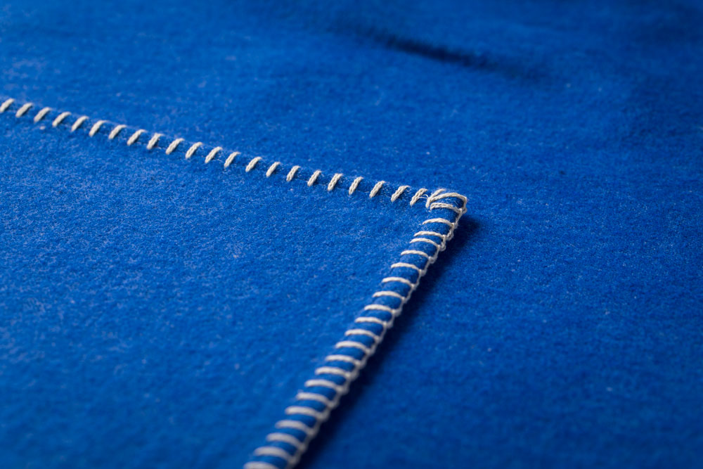 SYLT throw solid in . Throw Blanket made by David Fussenegger , a family-run mill in Austria.