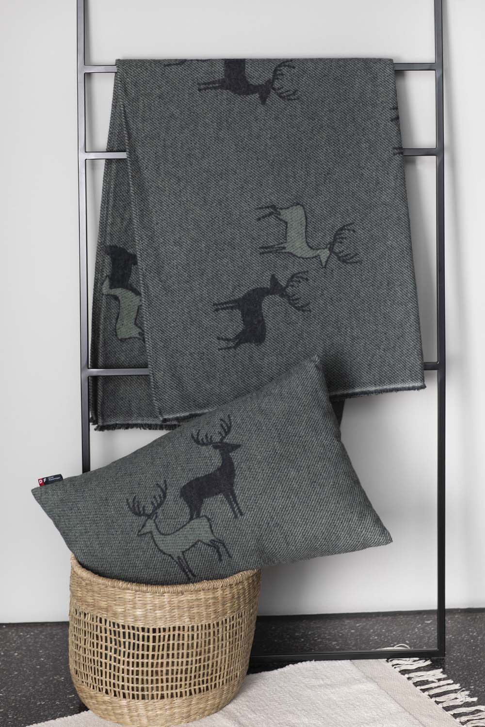 LUCA throw "pairs of stags" in . Throw Blanket made by David Fussenegger , a family-run mill in Austria.