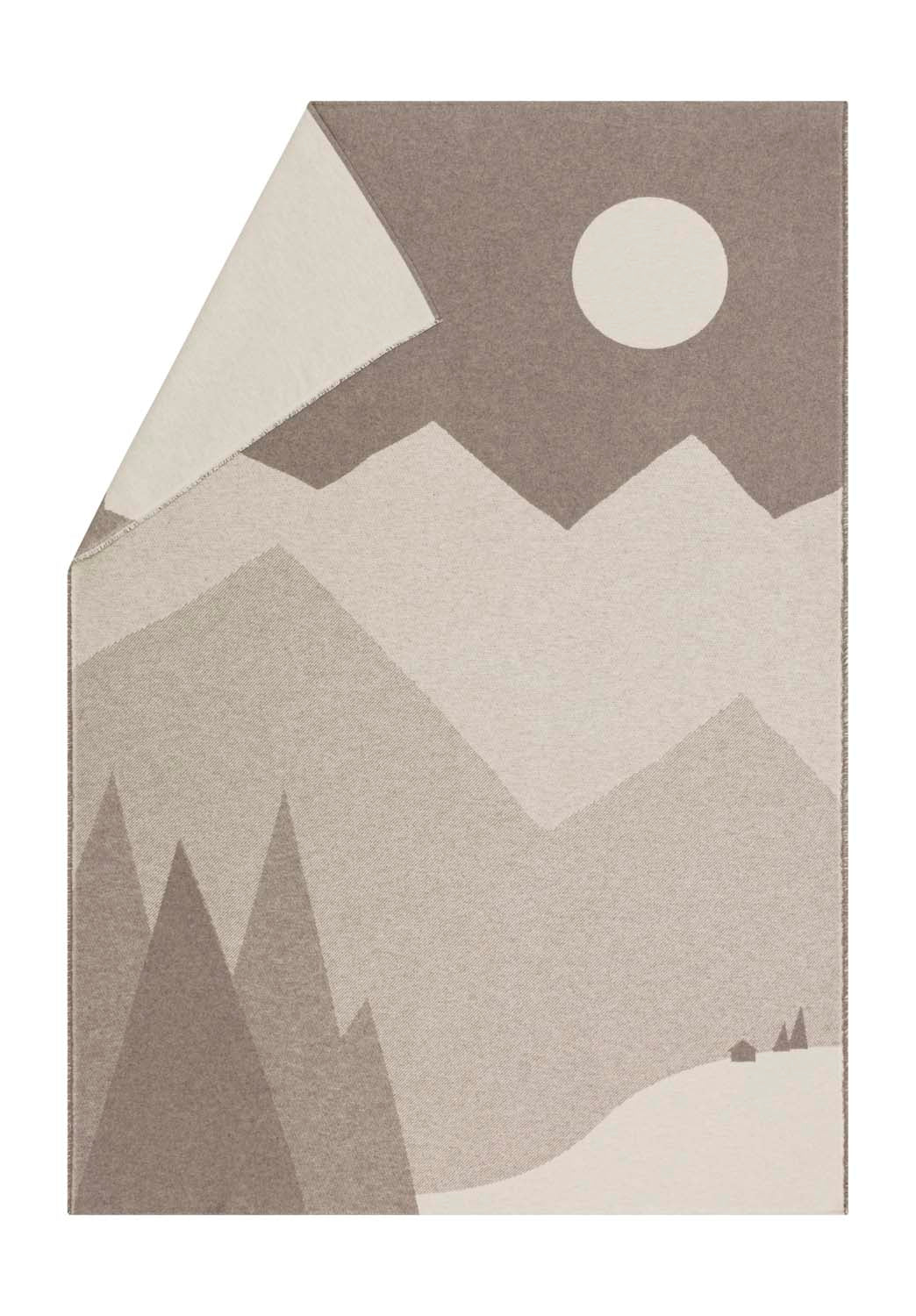 LUCA throw "mountains & moon" in smoke . Throw Blanket made by David Fussenegger , a family-run mill in Austria.