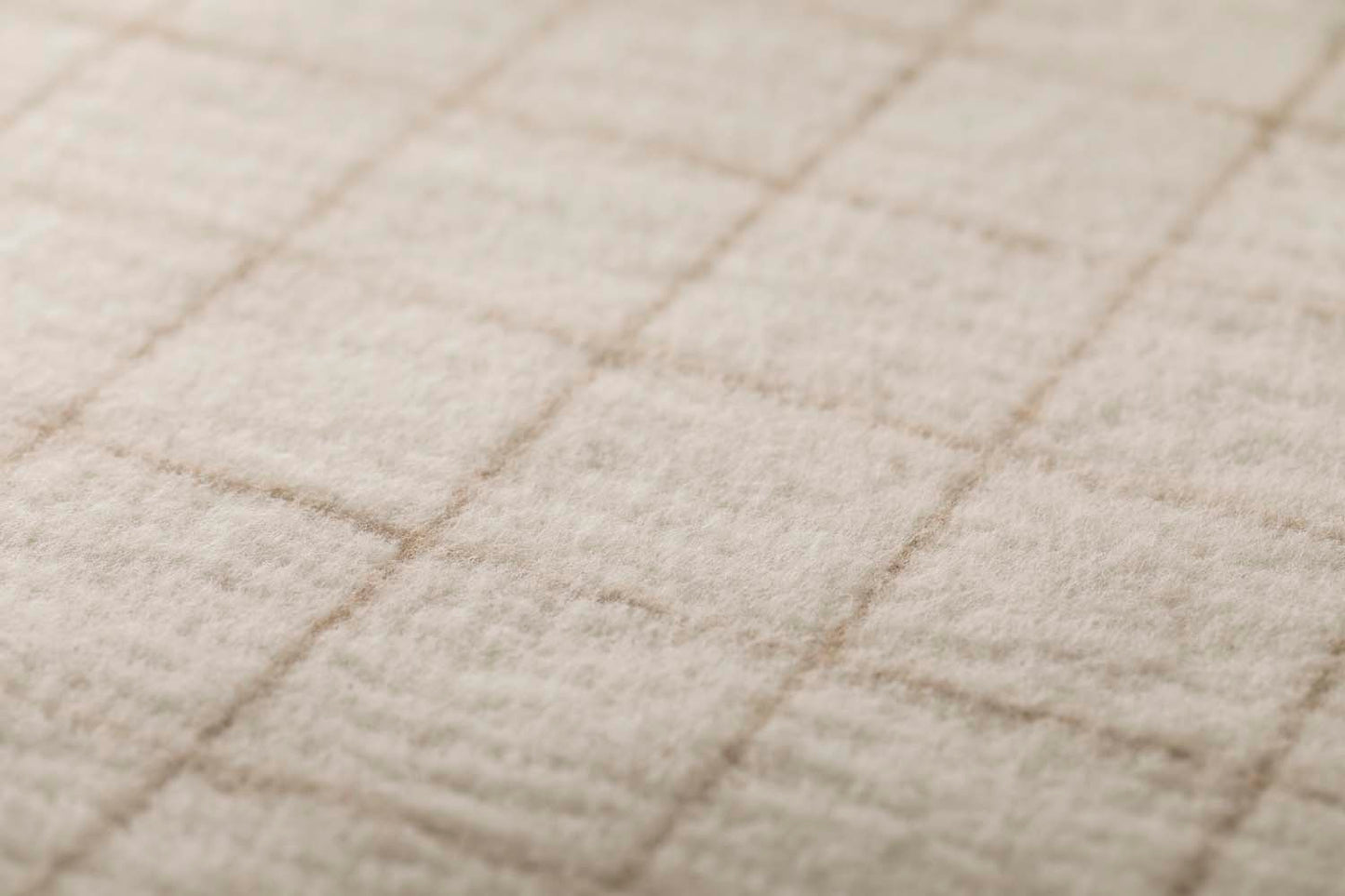MERANO throw "checkered" in . made by INDIGO 11 , a family-run mill in Austria.