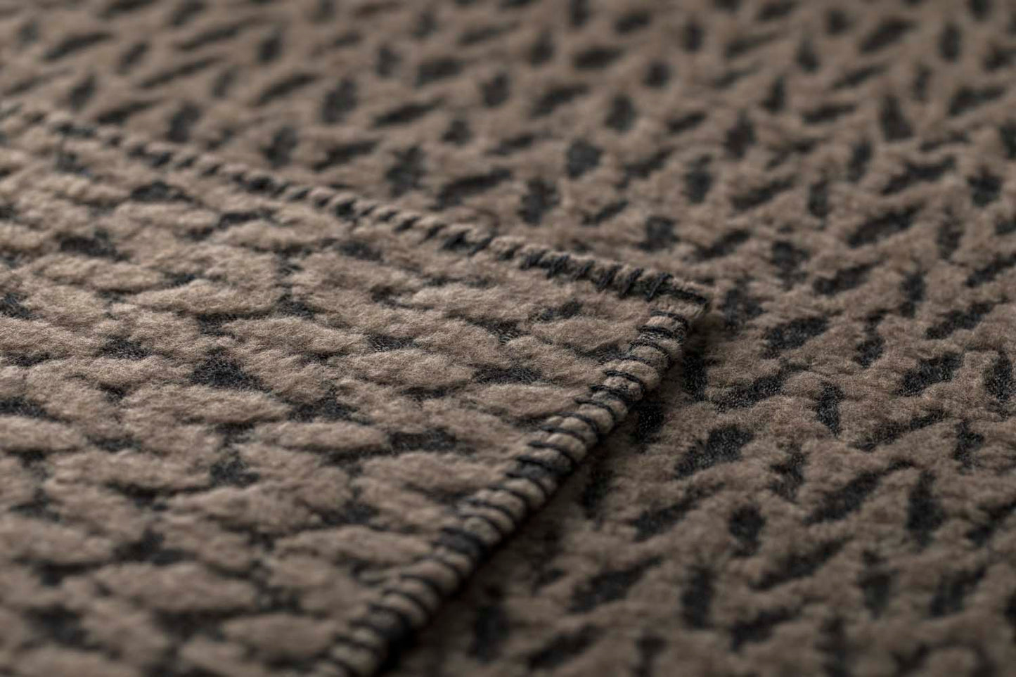 CARLA throw "knitted pattern" in . Throw Blanket made by David Fussenegger , a family-run mill in Austria.